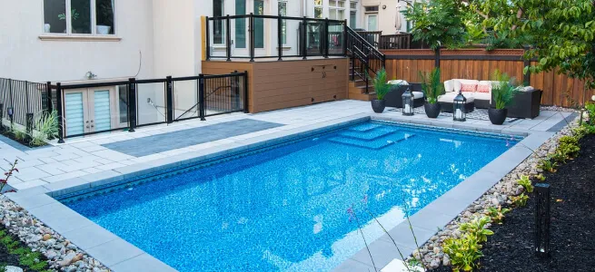 orange pools backyard pool with a patio and deck